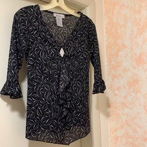 Almost new Nine West black/white blouse, 3/4 length ruffled sleeves, size XS.